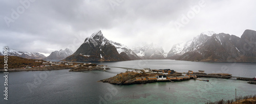 Panorama of Sakrisoy in Lofoten islands during bad weather with heavy wind and rain. Traveling and landscape concept.