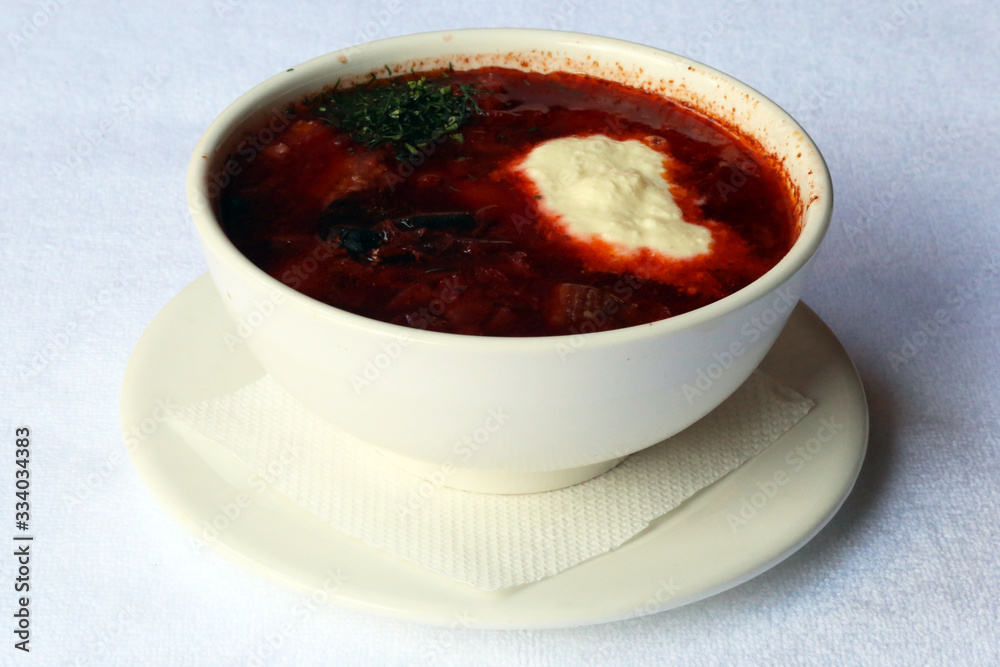 Borscht red beetroot soup with sour cream, dishes of Russian national cuisine Borscht red beetroot soup with sour cream, dishes of Russian national cuisine