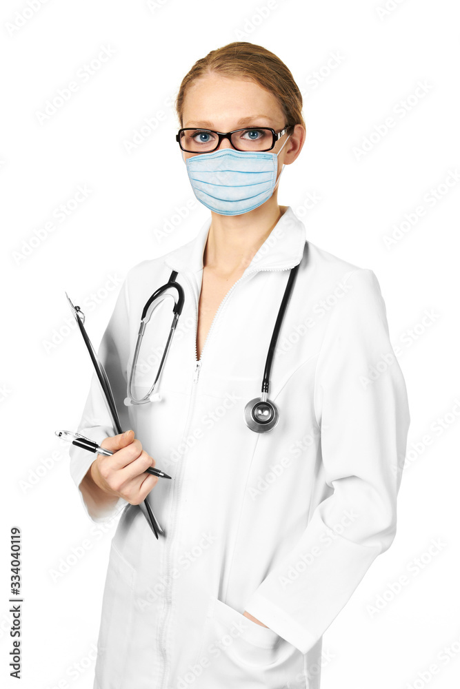 Female doctor with stethoscope in a protection mask