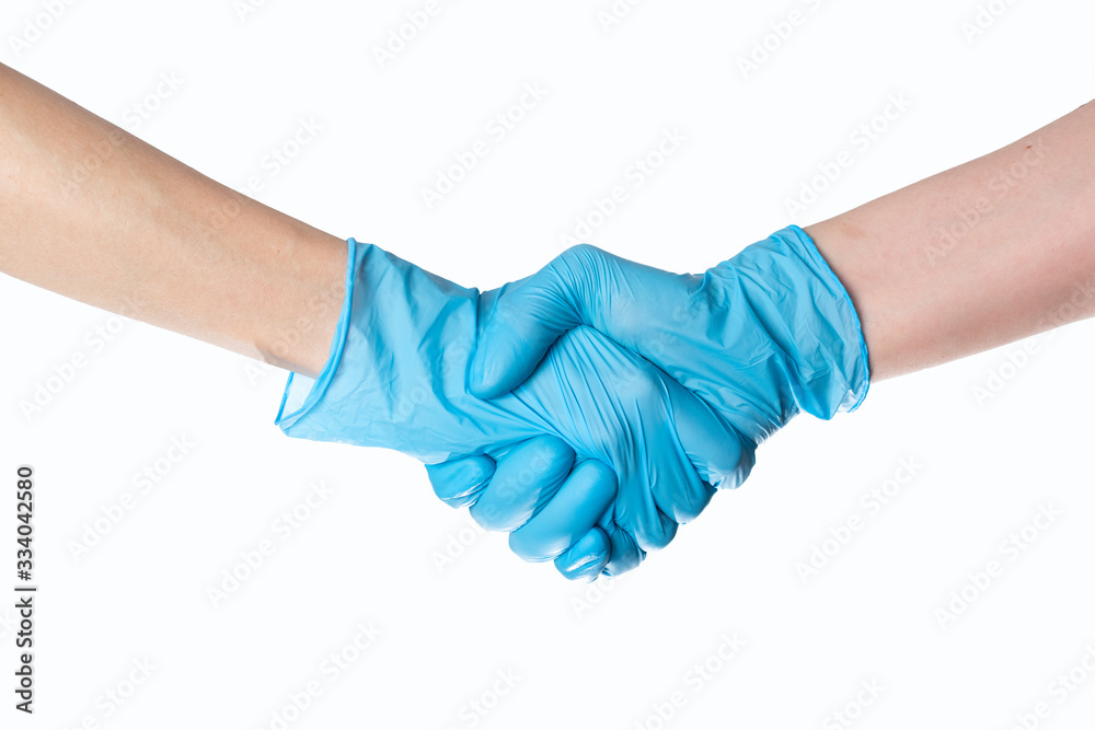 Handshake in gloves. epidemic 2020. the fight versus the virus .coronavirus. pandemic. covid-19 Handshake in gloves. epidemic 2020. the fight versus the virus .coronavirus. pandemic. covid-19