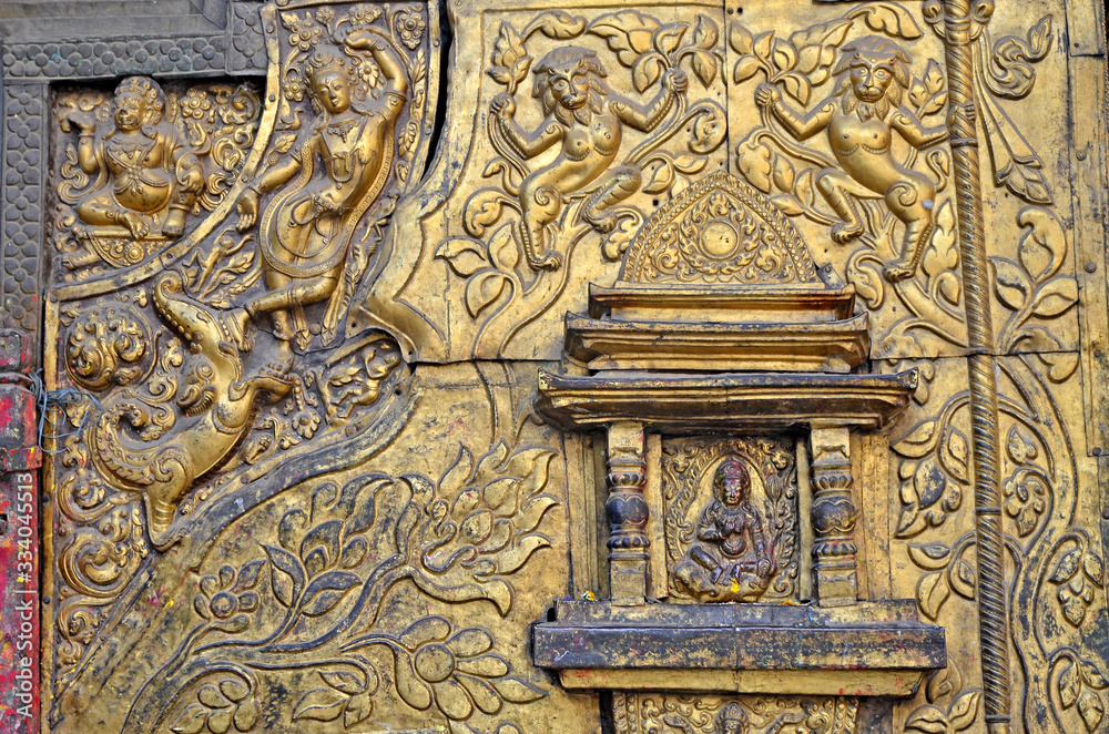 Beautiful ceremonial wall in temple in Nepal. Nepal is known by its crafts, especially wooden crafts.