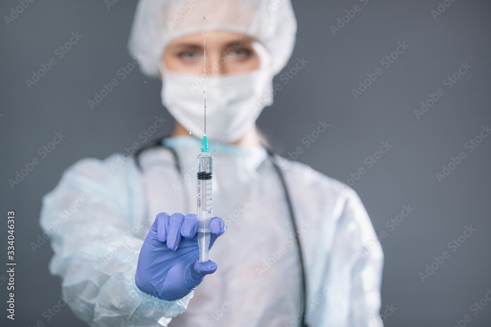 Syringe with medicine in good hands. Syringe with medicine in good hands.
