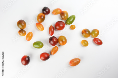 Fresh ripe mixed tomato verity assorted color on white background