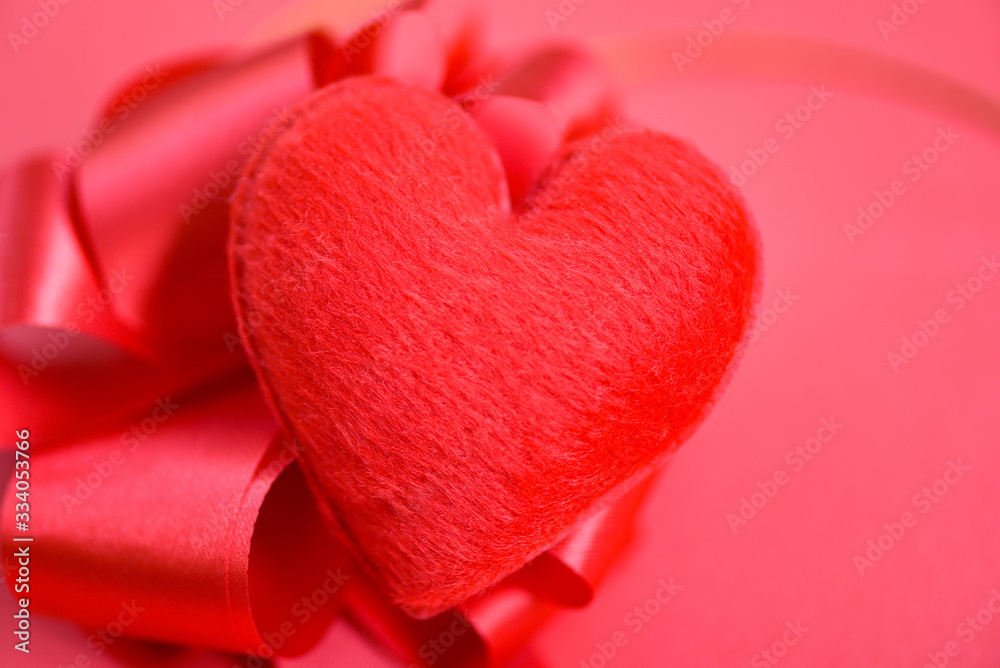 Heart on red background for philanthropy - Red heart valentines day or donate help give love warmth take care concept