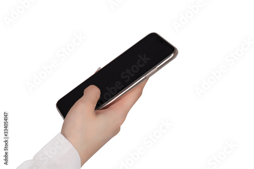 Hand holding phone isolated on white background in studio. Close up hand woman using phone on isolated. Free form copy space.