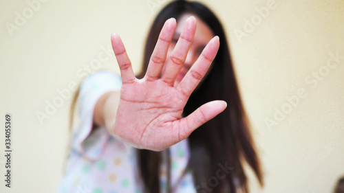 Cuadro en lienzo sexual abuse for women gender in society, a girl hand is stopping harassment on the bedroom of family