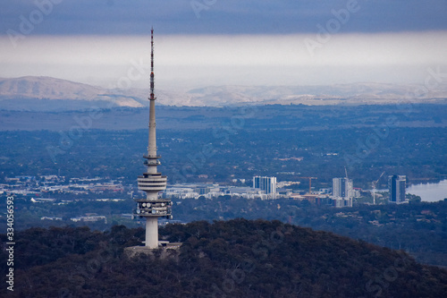 Aerial view over Canberra of Telstra Tower sunrise from hot air balloon