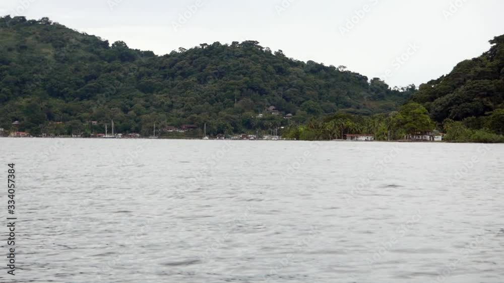 Panama and Isla Mamey seen from a boat in the ocean Panama and Isla Mamey seen from a boat in the ocean