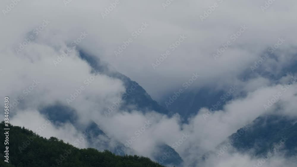 雲の流れる風景 山 雲海 木曽駒ケ岳 背景素材 雲の流れる風景 山 雲海 木曽駒ケ岳 背景素材