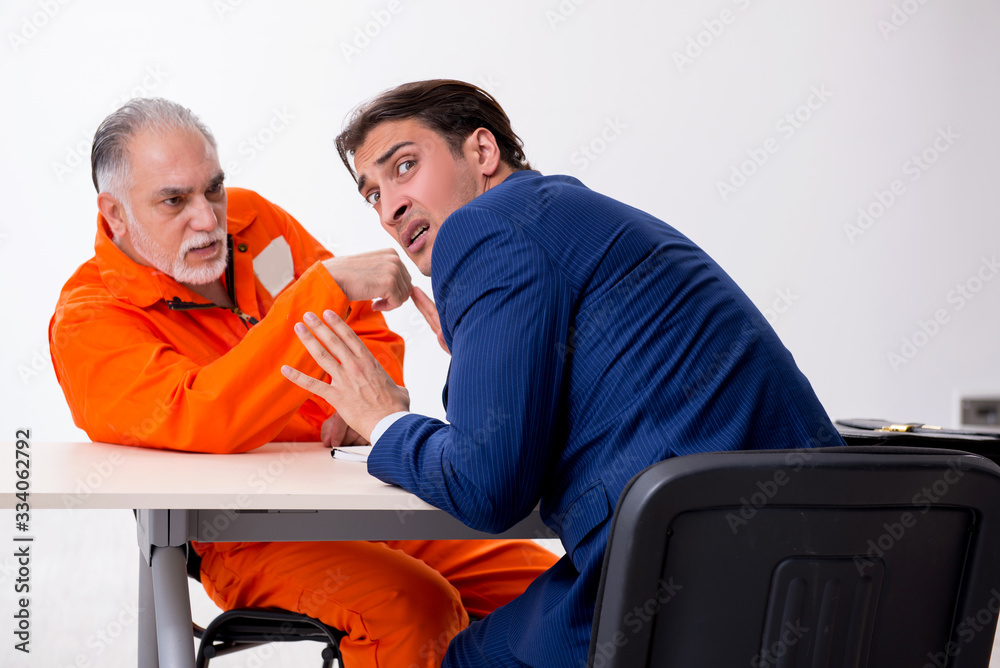 Old captive meeting with advocate in pre-trial detention Old captive meeting with advocate in pre-trial detention