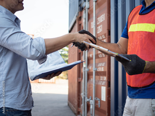 Businessmen ceo manager Customs Broker shake hand Shipper cargo Agreement Packing list Certificate of Origin Insurance Including Export Import Entry    