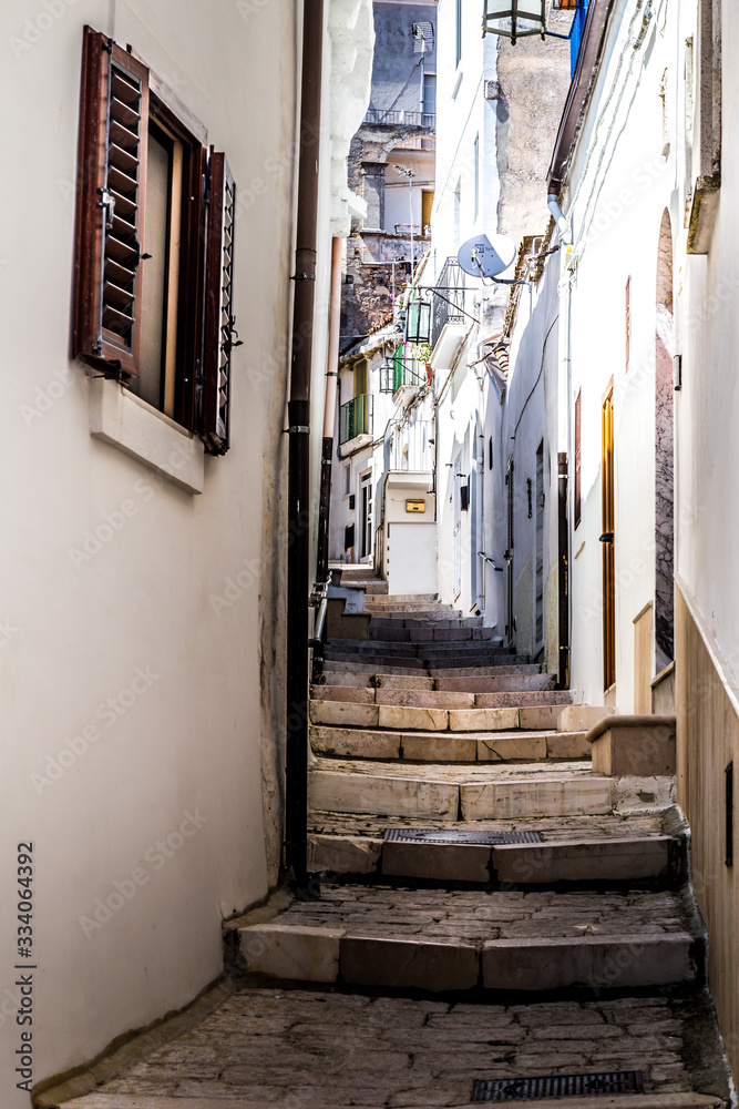 Narrow streets and stairs lined with white houses