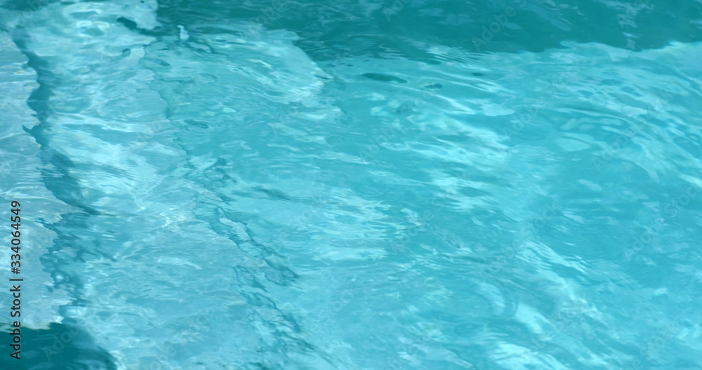 Swimming pool water wave in blue color Swimming pool water wave in blue color