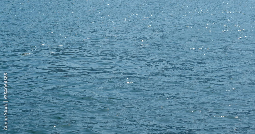 Sea surface water with sunlight sparkle Sea surface water with sunlight sparkle