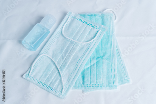 Coronavirus prevention medical surgical masks and hand sanitizer gel for hand hygiene corona virus protection.
