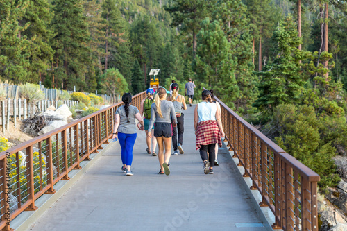 People on walking path recreational area near Lake Tahoe