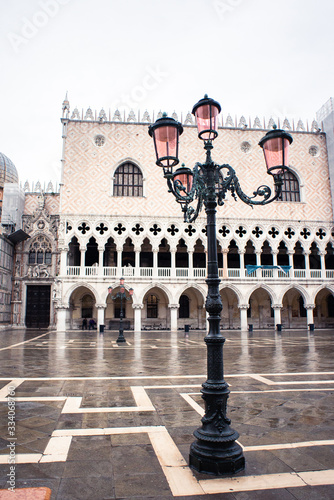 Old Street Lantern in Venice on San Marco Square. Early Rainy Morning. Cloudy Sky.