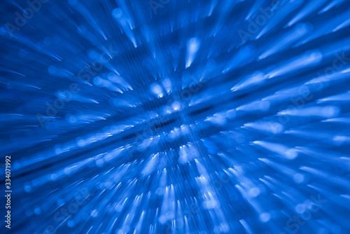 Abstract blue light background shot with zoom burst technique
