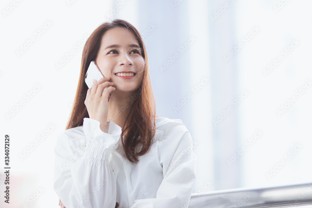 Asia woman using modern technology working,playing with happy. Asia woman using modern technology working,playing with happy.