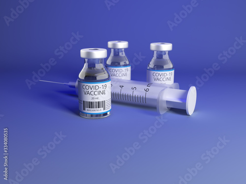Three vials of COVID-19 vaccine with a syringe for treating coronavirus
