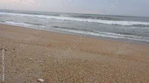 beach with sunrise background. beautiful sunrise over the seaBeautiful Cloudscape and Sunset Breaking Through Pink and Orange Clouds over the Sea photo