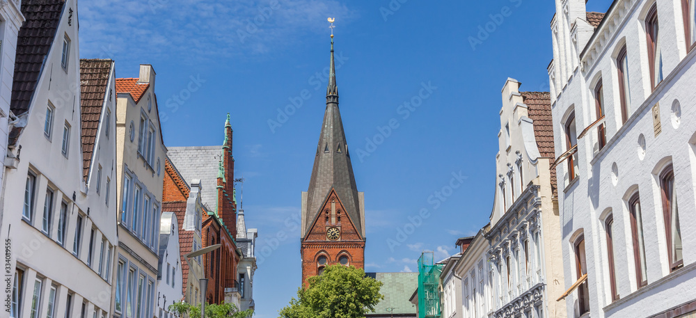 Fototapeta premium Church tower and historic facades in Flensburg, Germany