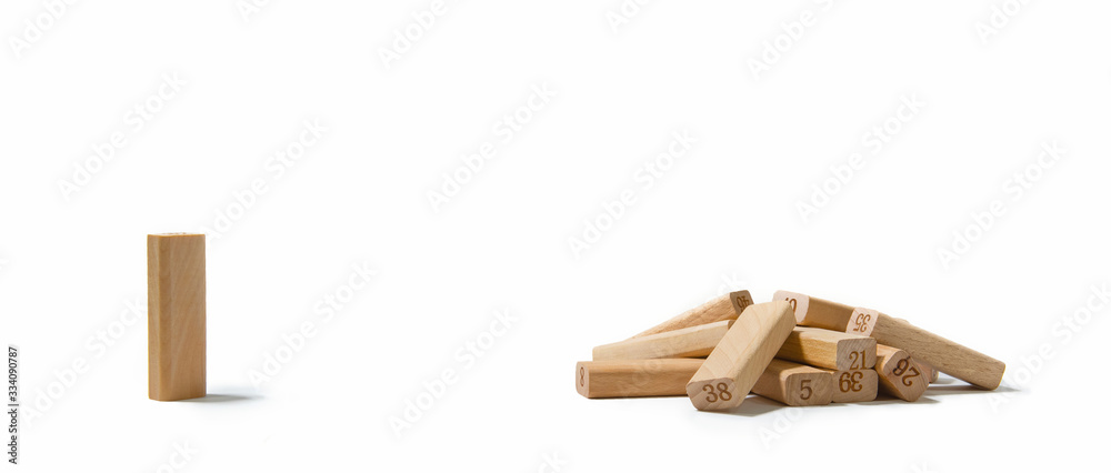 Social Distancing and quarantine impact on pandemic spread of a virus in population. Concept one wooden dominoes separated from falling dominoes for containing corona virus or pandemic outbreak. Social Distancing and quarantine impact on pandemic spread of a virus in population. Concept one wooden dominoes separated from falling dominoes for containing corona virus or pandemic outbreak.