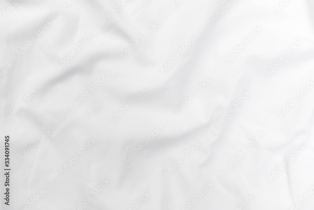 Abstract white fabric texture background. Wavy white cloth. 