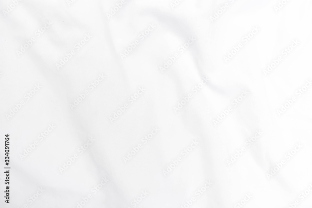 Abstract white fabric texture background. Wavy white cloth. 