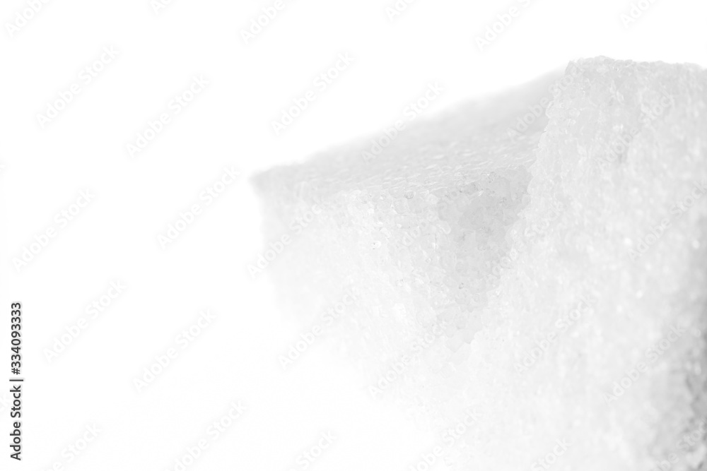 Light background with sugar cubes at high magnification. Light background with sugar cubes at high magnification.
