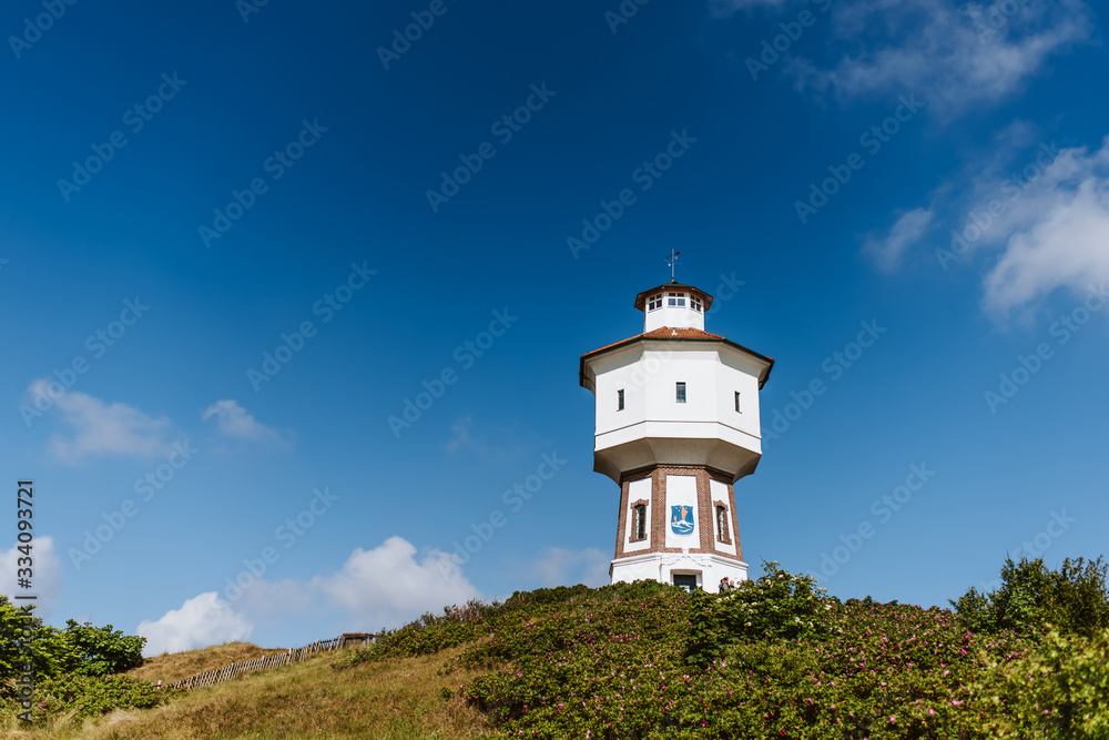 Water tower of the island Langeoog, Germany, sunny day, blue sky