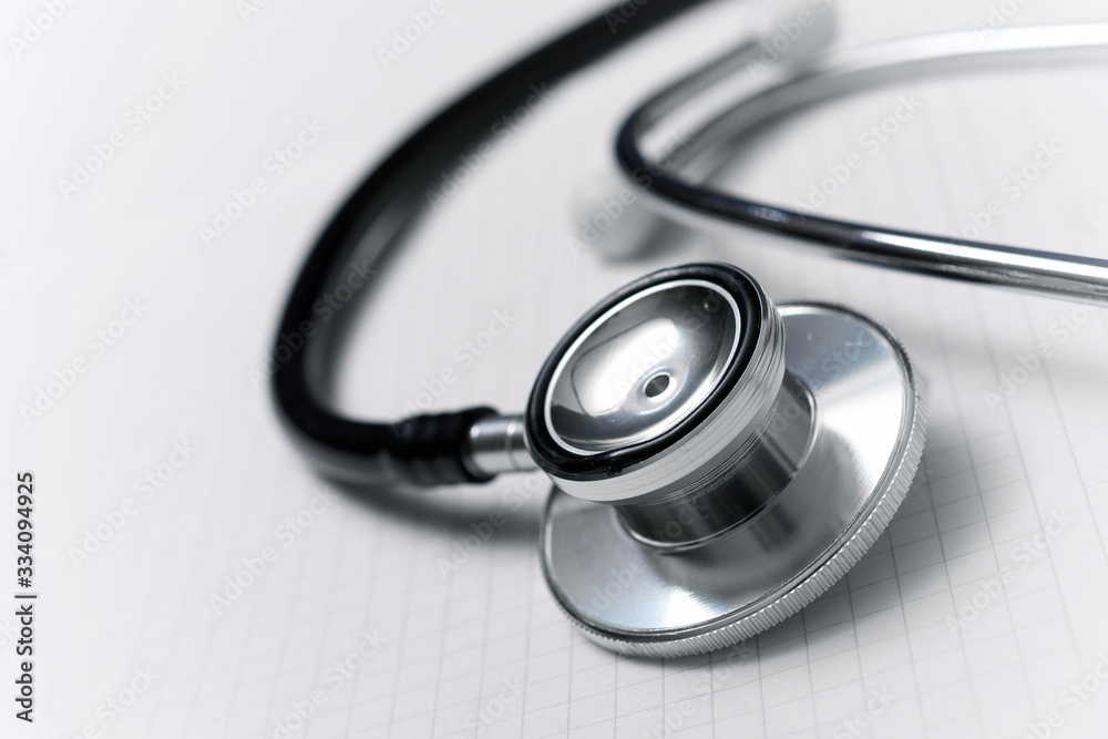 Stethoscope on graph paper. Stethoscope on graph paper.