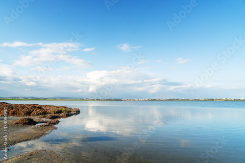 landscape with salt lake Larnaca and clouds