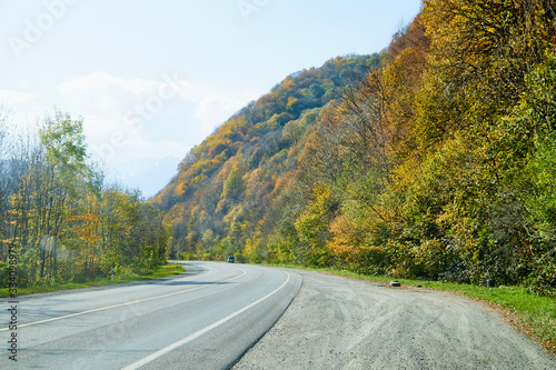 Beautiful landscape with empty road in the mountains in summer or autumn day