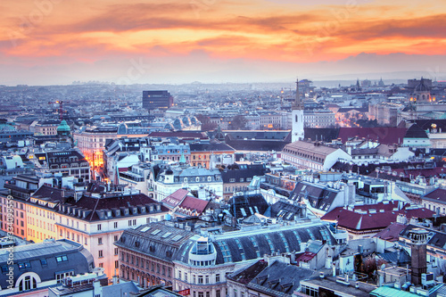 Austria, Vienna- View from the main cathedral of St. Stephen to the city, twilight. Evening view of the city of Vienna, the lights of the night city.