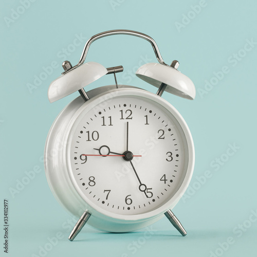 Old alarm clock light background place for your test