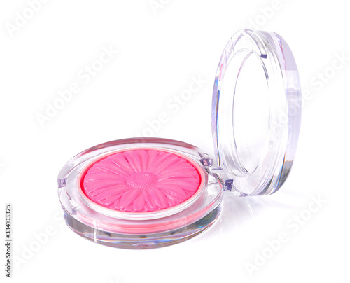 Make-up pink powder in plastic box isolated on white photo