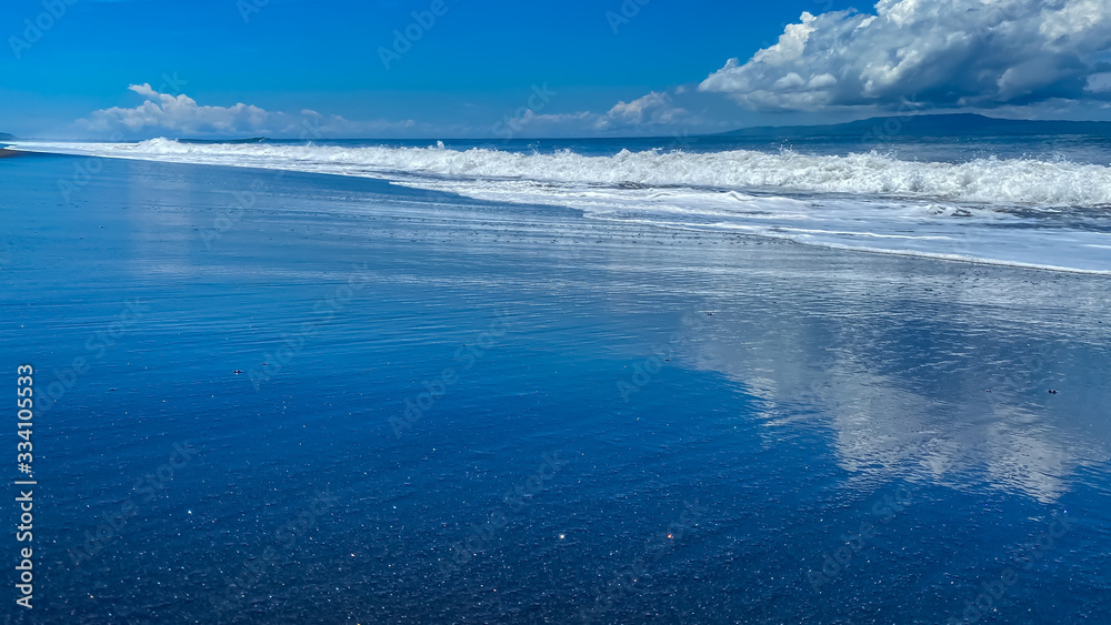 A desolate ocean shore with rolling waves. Background banner panorama