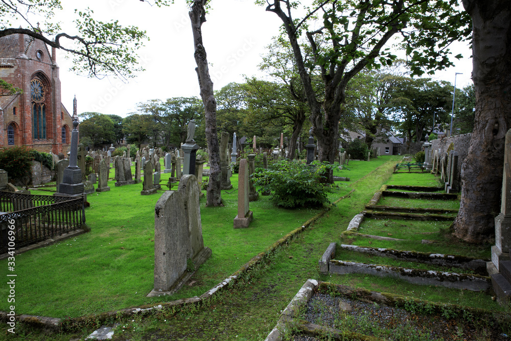 Kirkwall - Orkney (Scotland), UK - August 06, 2018: The cemetery at Saint Magnus cathedral in Kirkwall, Orkney, Scotland, Highlands, United Kingdom Kirkwall - Orkney (Scotland), UK - August 06, 2018: The cemetery at Saint Magnus cathedral in Kirkwall, Orkney, Scotland, Highlands, United Kingdom