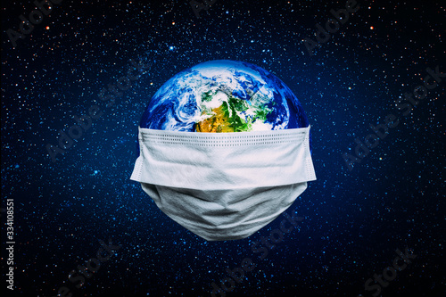 Fototapeta Naklejka Na Ścianę i Meble -  The whole earth is quarantined, the earth is wearing a mask Coronavirus and Air pollution pm2.5 concept. COVID-19 Elements of this image furnished by NASA