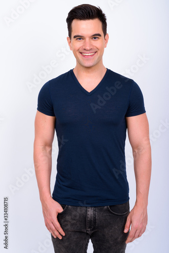 Portrait of happy young handsome man smiling