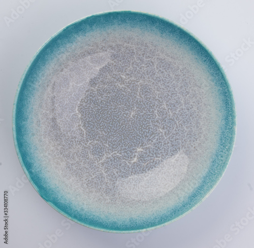 colorful ceramic plate on white background