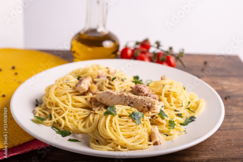  Seafood spaghetti with garlic and parsley. Healthy and nutritious Italian food. Blue fish, omega 3 recipe.