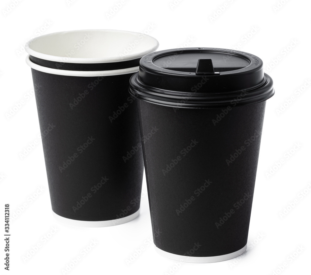Paper coffee cups isolated on white background. Close up. Paper coffee cups isolated on white background. Close up.