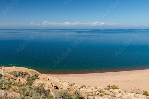 Issyk-Kul Lake, empty sandy beach on the southern shore of the lake, Kyrgyzstan