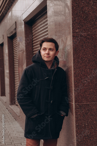 portrait of a young guy on the street
