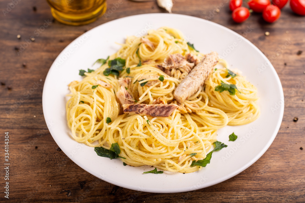 Seafood spaghetti with garlic and parsley. Healthy and nutritious Italian food. Blue fish, omega 3 recipe. Seafood spaghetti with garlic and parsley. Healthy and nutritious Italian food. Blue fish, omega 3 recipe.