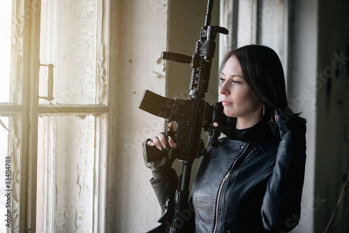 Wallpaper Mural Concept of special agent girl with airsoft rifle is looking in window. Torontodigital.ca