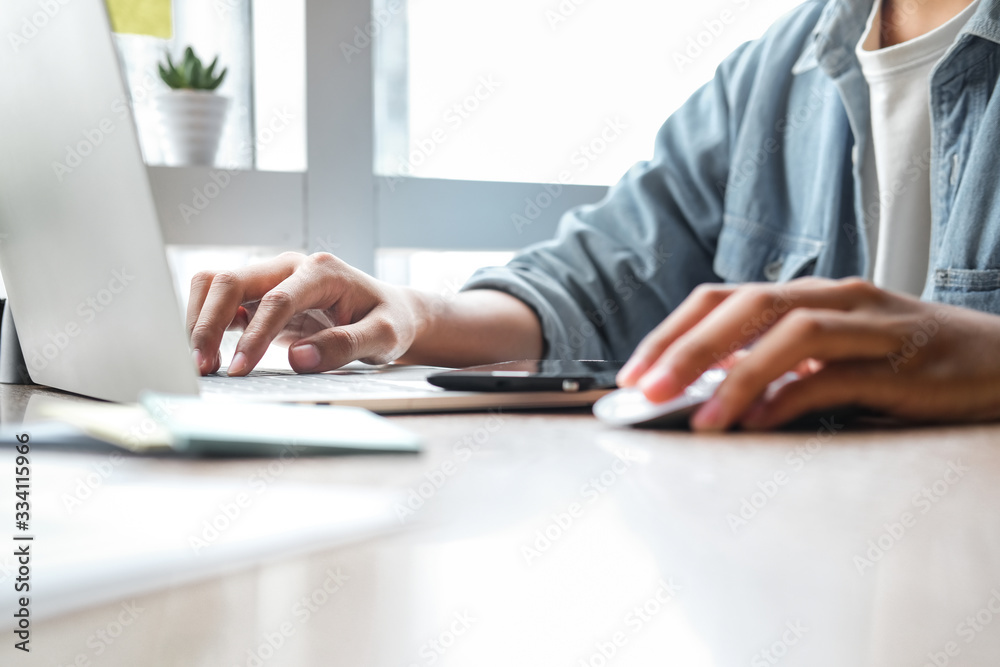 Close up of man hands working with laptop at office. Business concept. Close up of man hands working with laptop at office. Business concept.