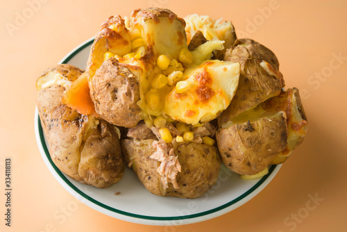 Jacket potato of tuna, mayonnaise and corn photo